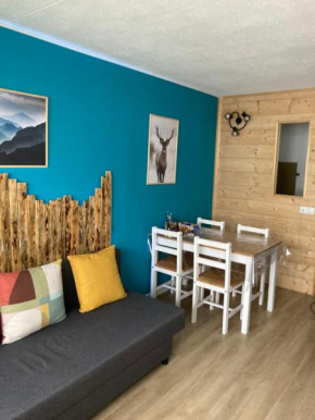 Studio mongie aux pieds des pistes avec balcon